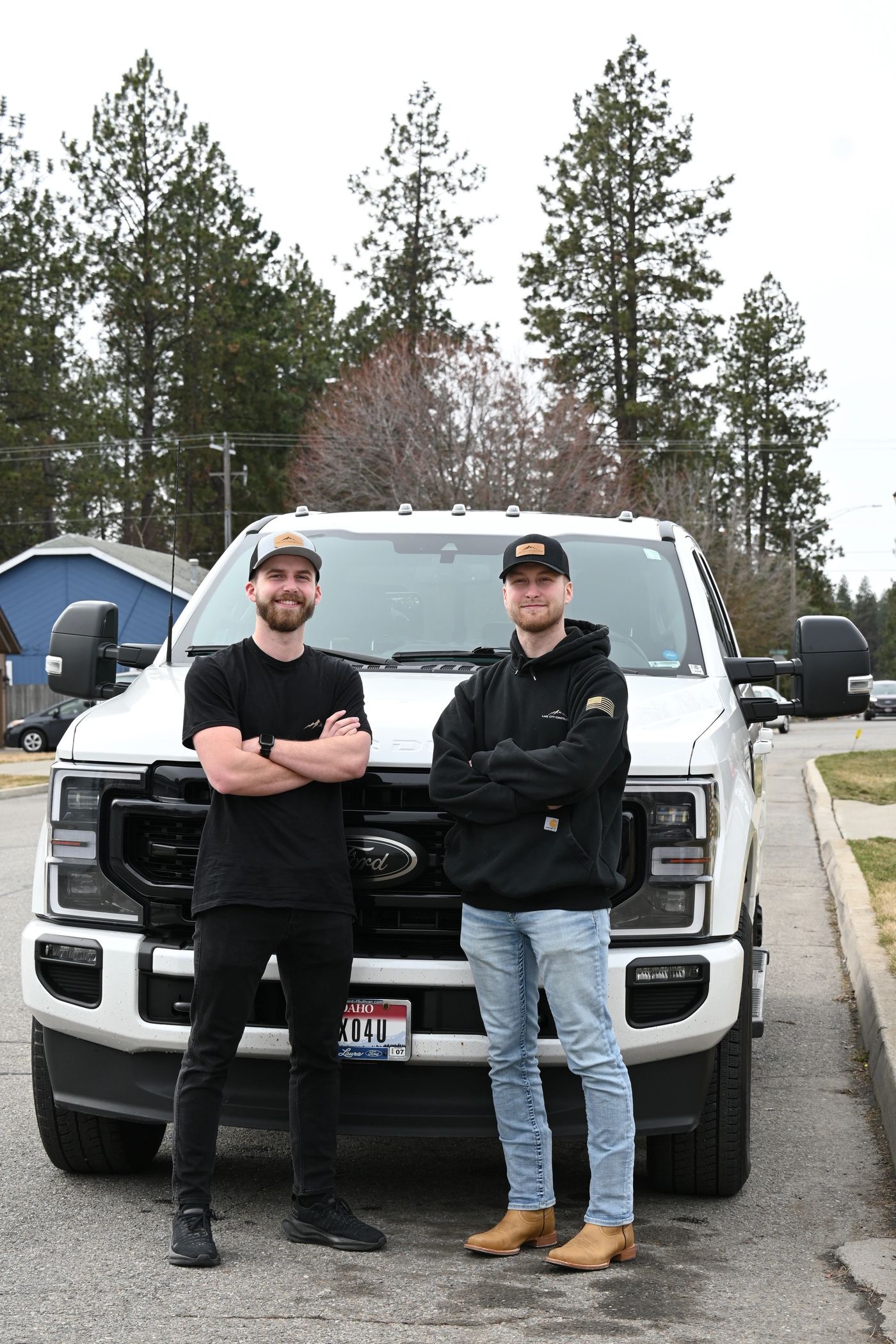 Lake City Construction team standing in front of their work truck